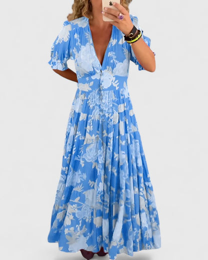 Minelda | Elegantti kukkakuosiset V-pääntie mekko