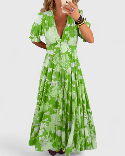 Minelda | Elegantti kukkakuosiset V-pääntie mekko