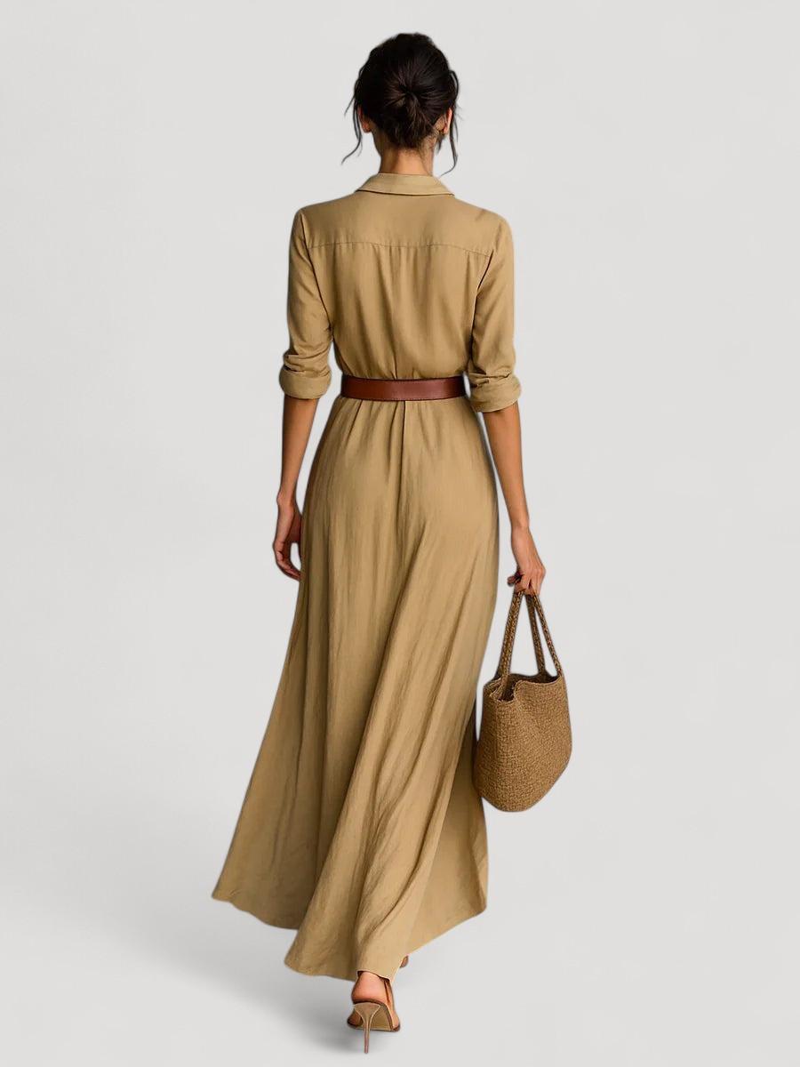 Pitkä vyöllinen mekko pitkillä hihoilla ja käänteillä